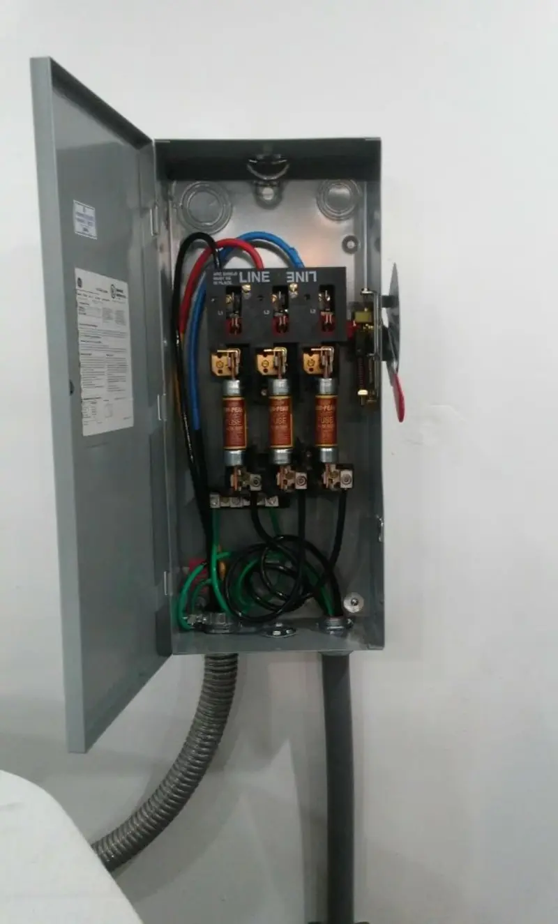 Three-phase disconnect switch installed for Smoke Detector Installation in Wagoner